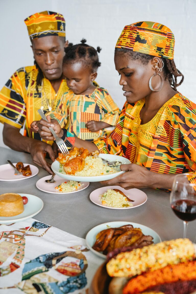 A family sharing a nutritious meal of rice and chicken to maintain energy levels.